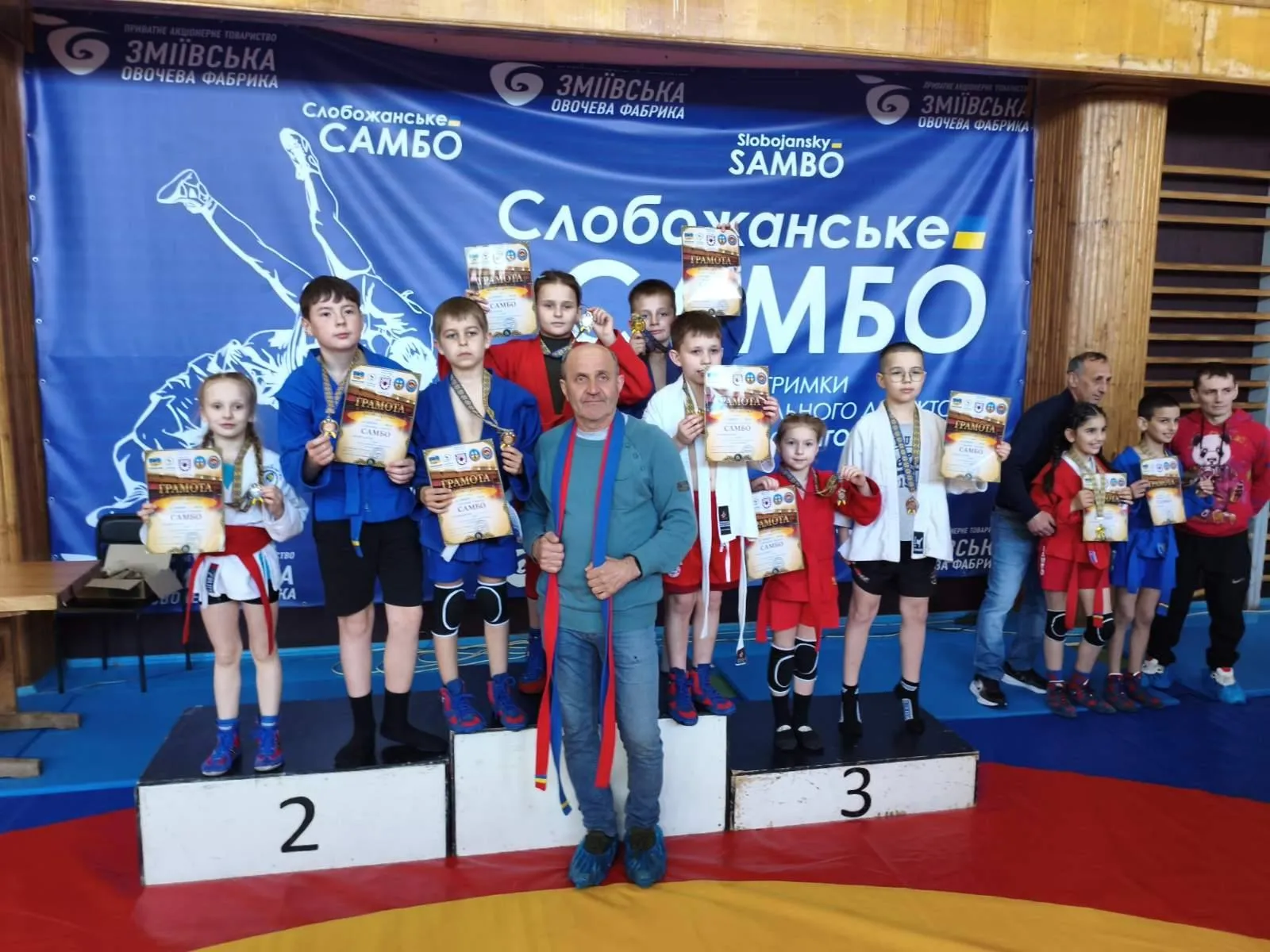 Головна світлина новини на сайті Gromada Group Сахновщинські юні самбісти змагалися у місті Слобожанське на порталі Gromada Group